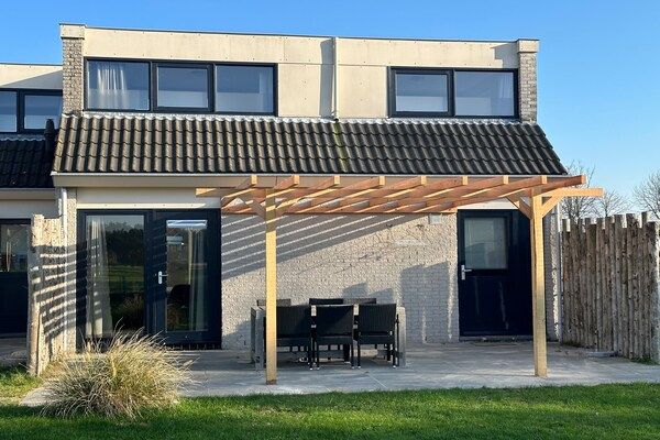 Buitenkant - Vakantiehuis op Texel met Terras in De Cocksdorp (2)