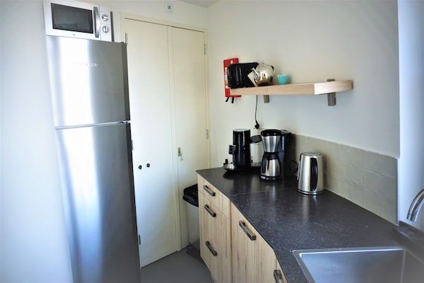 Keuken - Luxe watertoren vlakbij het strand in Vlissingen (5)