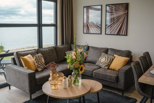 Woonkamer - Huis in Arnhem met uitzicht op de Rijn in Maurik (2)