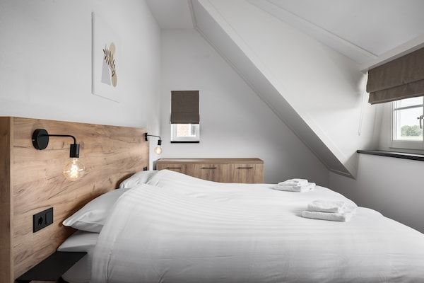 Slaapkamer - Villa in Someren met sauna bij golfbaan in Someren (5)