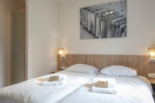 Slaapkamer - Villa bij Noordzeestrand, ideaal voor gezinnen in Cadzand-Bad (3)