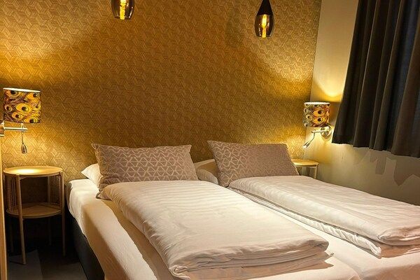Slaapkamer - Wellnessretraite met privéjacuzzi in Dalerveen (3)