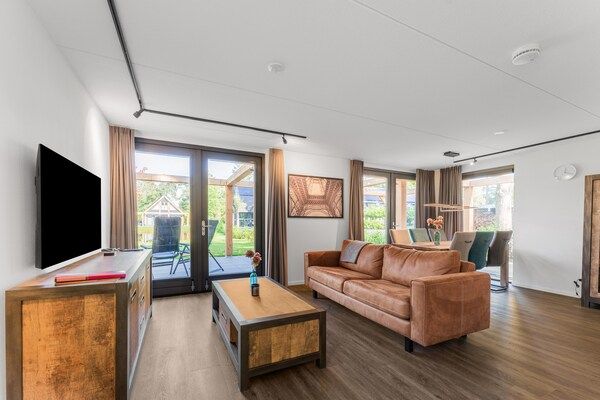 Woonkamer - Vakantiehuis in Lochem met Tuinzicht in Lochem (3)