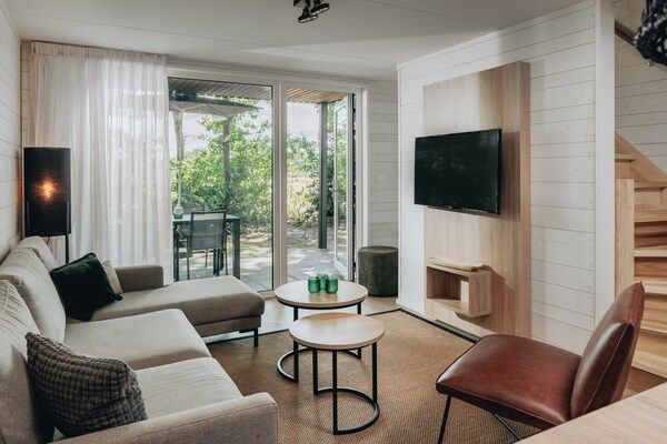 Woonkamer - Ruime villa in bospark in Schaijk (1)
