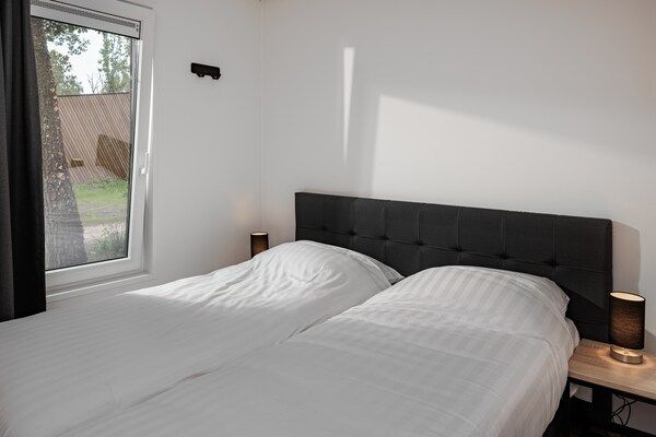 Slaapkamer - Lodge in Schaijk met omheinde tuin in Schaijk (5)