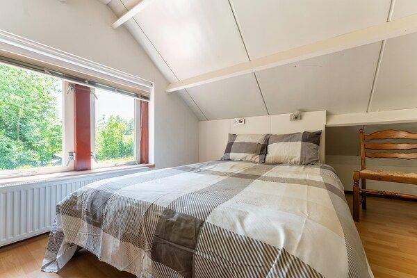 Slaapkamer - Vakantiehuis Zeeland bij Westerschelde in Baarland (5)