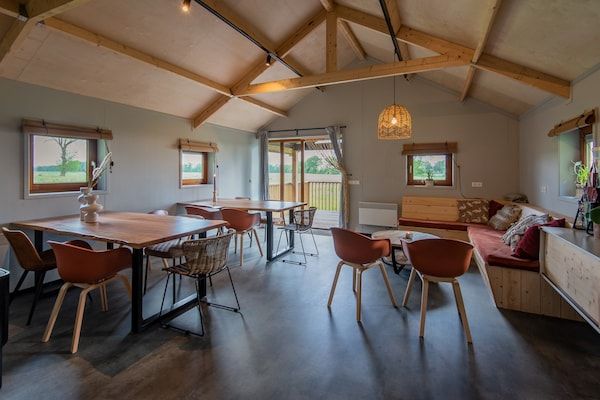 Woonkamer - Lodge in Drenthe met uitzicht veranda in Ruinerwold (2)