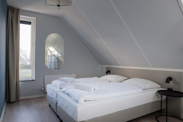 Slaapkamer - Vakantiehuis bij Noordzeestrand Nieuwvliet-Bad in Nieuwvliet (5)