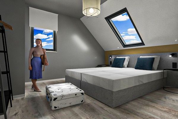 Slaapkamer - Luxe villa in Nieuwvliet-Bad met privézwembad in Nieuwvliet (3)