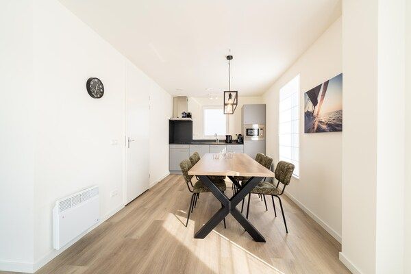 Keuken - Mooi vakantiehuis met sauna nabij een meer in Simonshaven (5)