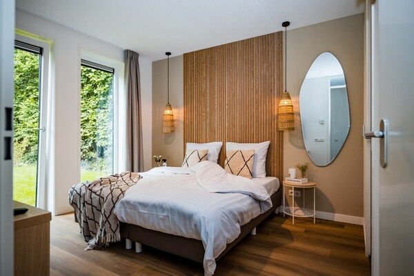 Slaapkamer - Vakantiehuis in Voorthuizen bij bos in Voorthuizen (3)