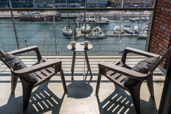 Terras - Harbor Breeze: modern verblijf in Scheveningen (5)