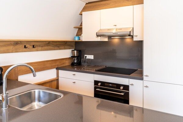 Keuken - Vakantiehuis in bos bij vijver in Baars (5)