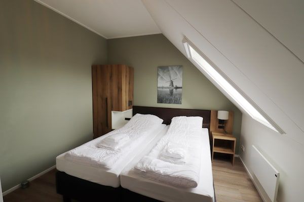 Slaapkamer - Gezinsvriendelijke villa in Leons in Leons (5)