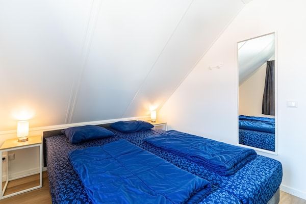 Slaapkamer - Vakantiehuis met veel privacy in Simonshaven (4)