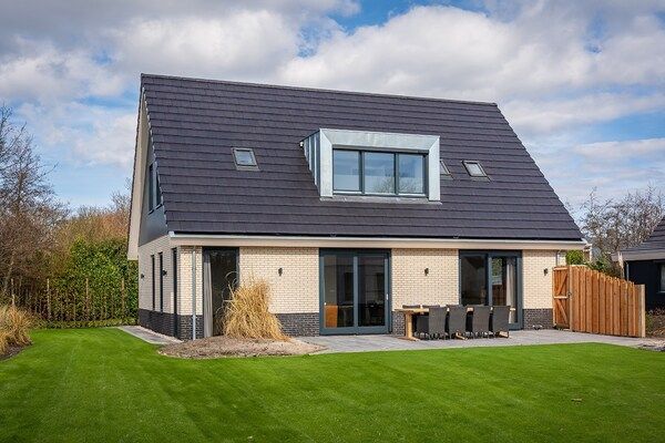 Buitenkant - Vakantiehuis op Texel met eigen terras in De Cocksdorp (1)