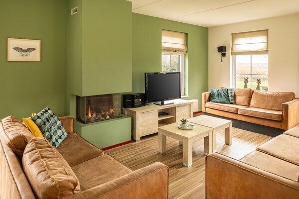 Woonkamer - Vrijstaande bungalow Wellness 16 in Vlagtwedde (3)