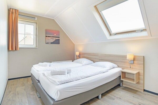 Slaapkamer - Vakantiehuis in Zeeland bij Noordzeestrand in Nieuwvliet (3)
