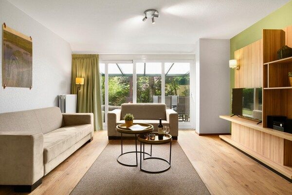 Woonkamer - Vakantiehuis in Brabant met Tuin & BBQ in Diessen-Baarschot (3)