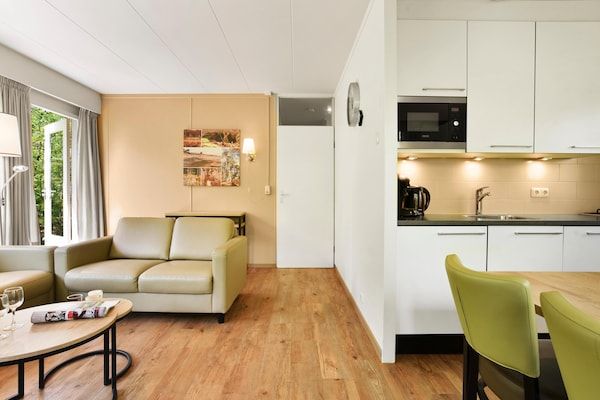 Keuken - Bosbungalow met zwembad in Putten (4)