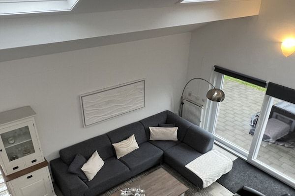 Woonkamer - Strandvilla Juliana in Julianadorp Niederlande (1)