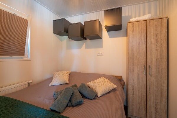 Slaapkamer - Lodge bij Veluwe Bos Hattemerbroek in Hattemerbroek (5)