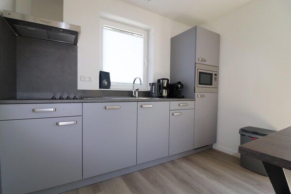 Keuken - Vakantiehuis bij Meerstrand Simonshaven in Simonshaven (4)