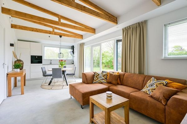 Woonkamer - Eureka 36 bungalow voor 4 personen met tuin in Sint Maartensvlotbrug (2)