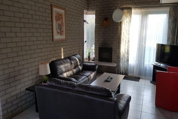 Woonkamer - Huis in Breskens bij Strand en Vuurtoren in Breskens (2)
