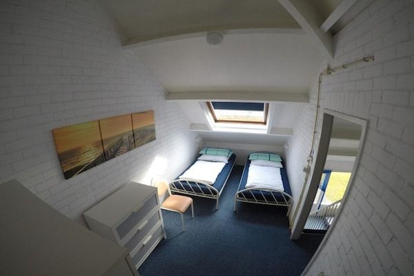 Slaapkamer - Vakantiehuis in Breskens bij het strand in Breskens (4)