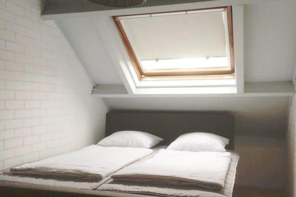 Slaapkamer - Duinrooswoning met terras in Breskens (3)