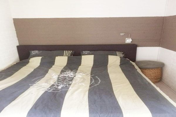 Slaapkamer - Duinrooswoning met terras in Breskens (4)