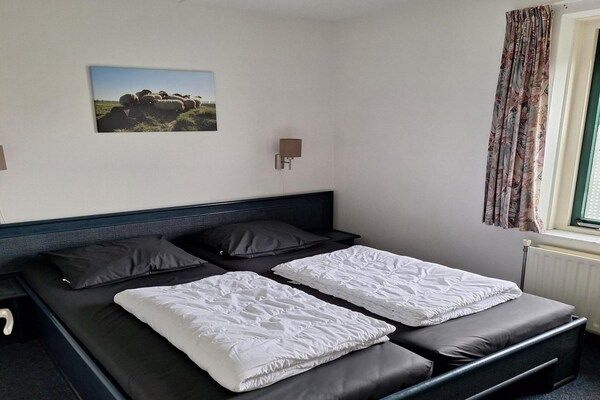 Slaapkamer - Vakantiehuis Breskens bij de kust in Breskens (4)