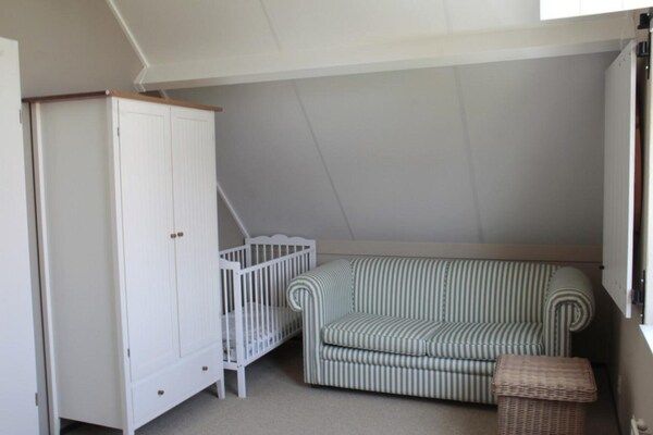 Slaapkamer - Vakantiehuis Breskens bij de Kust in Breskens (5)
