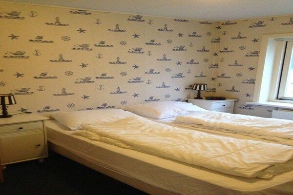 Slaapkamer - Historisch huisje met tuin in Breskens (4)
