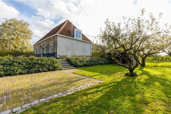 Tuin - Boerderij in Zeeland met molenuitzicht in Heinkenszand (5)