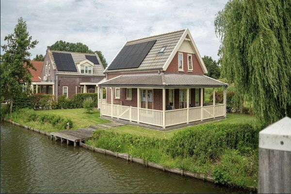 AreaSummer1KM - Bungalow aan het Water met Sauna in Zuid-Holland in Simonshaven (2)