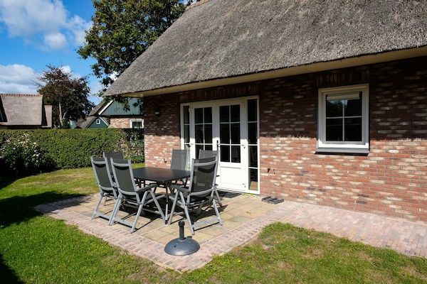 Terras - 6-persoons vakantievilla met tuin in Sint Maartenszee (1)