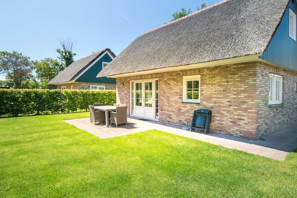 Tuin - Vakantiehuis voor zes gasten in Sint Maartenszee (1)