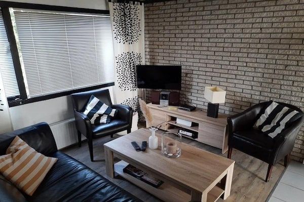 Woonkamer - Vakantiehuis met groot terras in Sint Maartenszee (3)