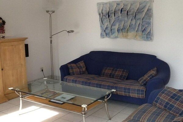 Woonkamer - bungalow voor 6 personen, vlakbij het strand in Sint Maartenszee (3)