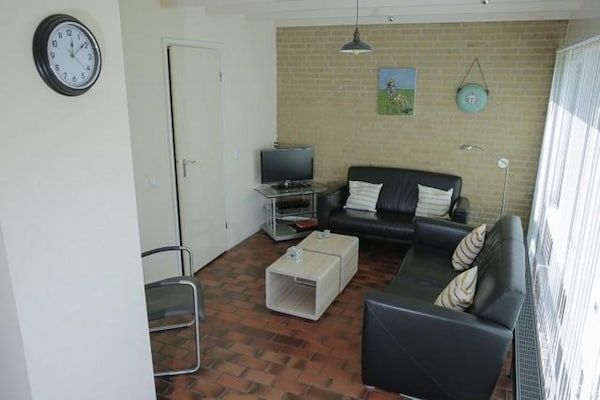 Woonkamer - Bungalow met tuin op het zuiden in Sint Maartenszee (3)