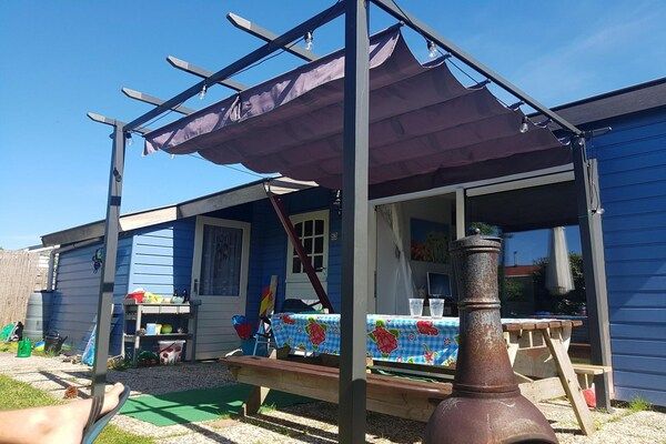 Buitenkant - Aantrekkelijke bungalow vlakbij strand en duinen in Sint Maartenszee (5)