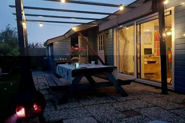 Terras - Aantrekkelijke bungalow vlakbij strand en duinen in Sint Maartenszee (3)