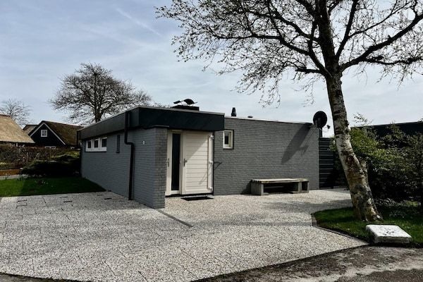Buitenkant - Leuke bungalow voor familievakantie in Sint Maartenszee (1)