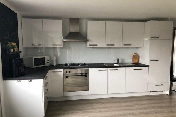 Keuken - Leuke bungalow voor familievakantie in Sint Maartenszee (4)