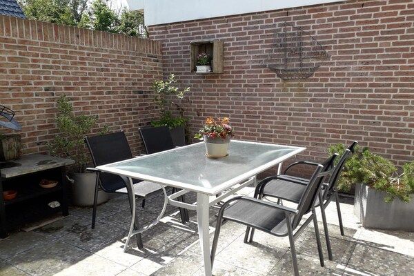 Terras - Vakantiehuis vlakbij centrum Petten in Petten (2)