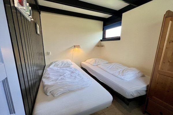 Slaapkamer - Bungalow voor 4 personen in Wildrijk in Sint Maartenszee (5)