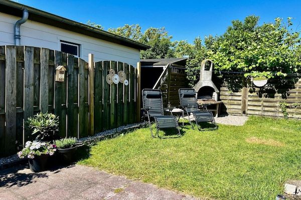 Tuin - Bungalow in park met omheinde tuin in Sint Maartenszee (5)