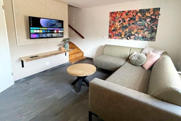 Woonkamer - Vakantiehuis in Voerendaal met terras in Voerendaal (5)